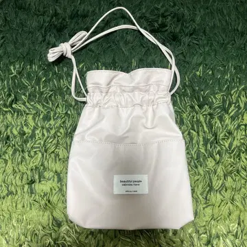 beadind people 드로우 스트링 숄더백 베이지