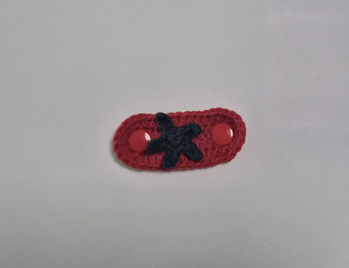 Knitted Tomato Cord Keeper