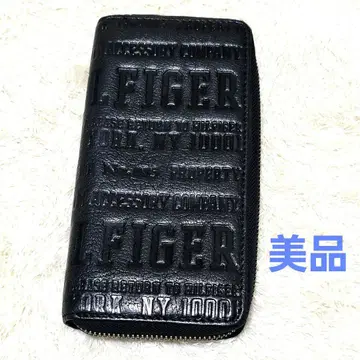 새상품급 Tommy HILFIGER 장지갑 라운드 원 지퍼 가죽 올 패턴