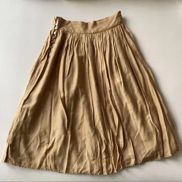 NIMES 님 베이지 플리츠 스커트