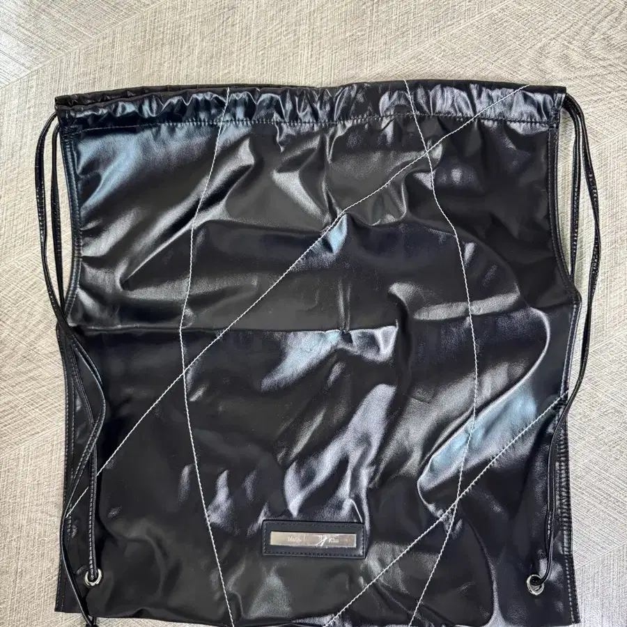 【マーティンキム】Matin Kim String Coating Backpack Black Matin Kim String Coating Backpack Black - SS25 - US