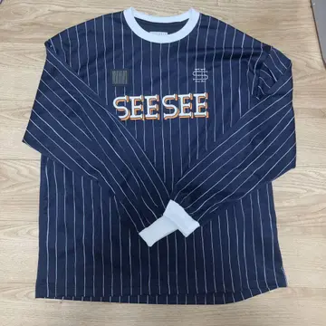 SEESEE x S.F.C 게임 LS 스트라이프 티셔츠 YGM