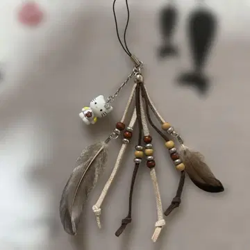 깃털 키티 스트랩