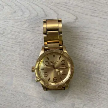 배터리 소모 Nixon 골드 아날로그 손목시계