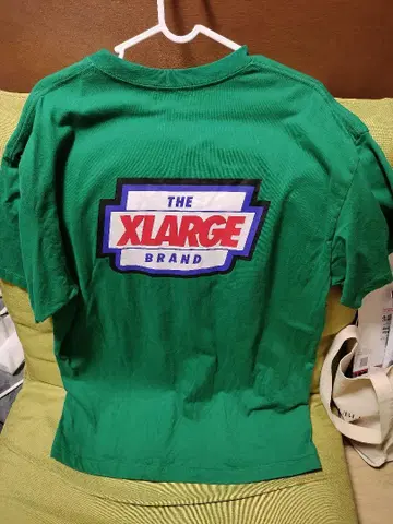 XLARGE 그린 티셔츠 포켓 부착