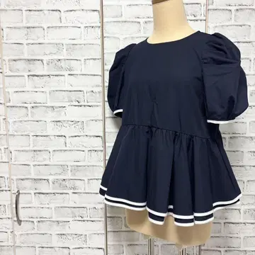 Fit more 핏모어 2단 프릴 백 리본 파이핑 탑
