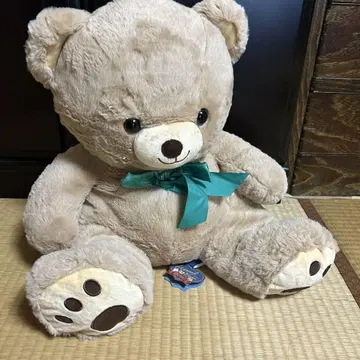 큰 베이지색 곰 봉제 인형