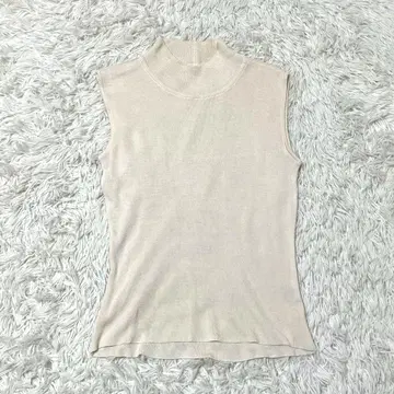 FOXEY BOUTIQUE 폭시 슬리브리스 니트 실크 하이넥