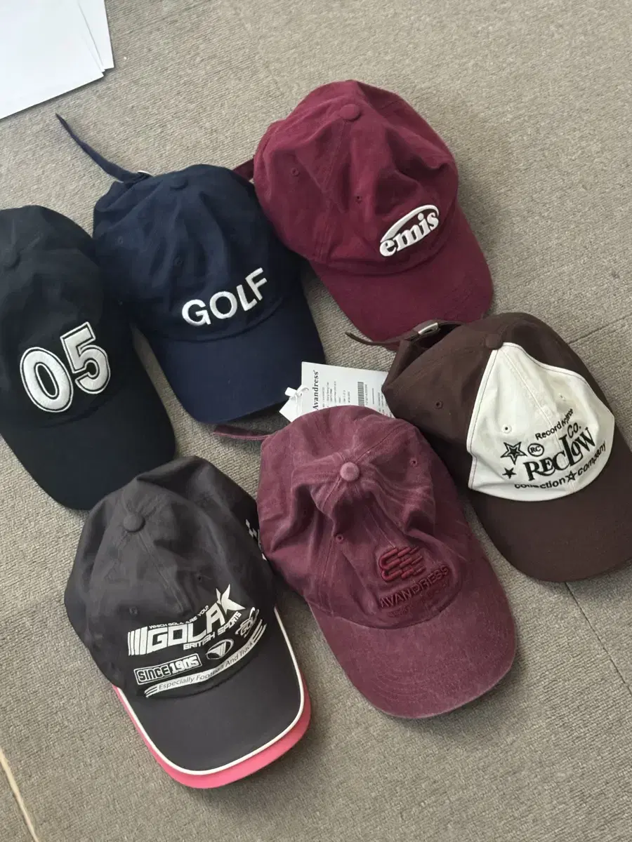 Collection of Ball Caps from emis, Reclow, and Urban Dress