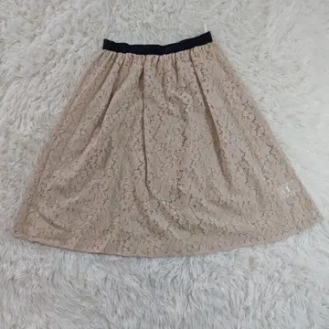 ELLE (엘르) 전체 레이스 플레어 무릎 기장 스커트