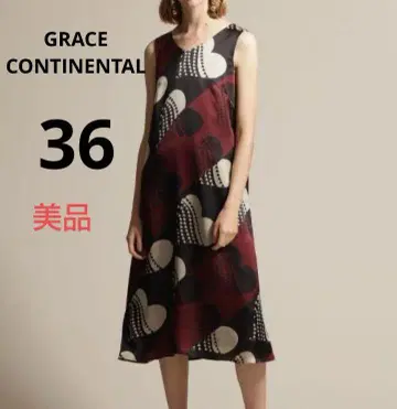 GRACE CONTINENTAL 브라운 광택감 롱 점퍼 스커트 F