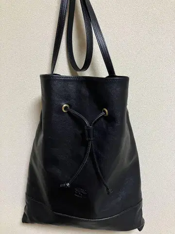 IL BISONTE 블랙 가죽 드로우 스트링 백