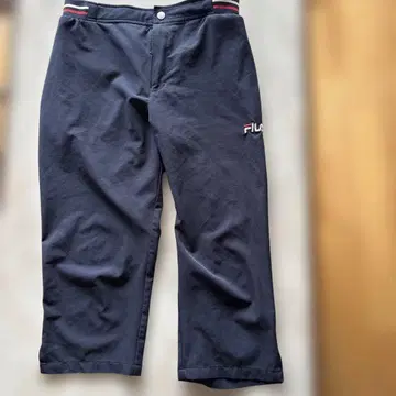 휠라 (FILA) 여성용 윈드 쿼터 팬츠
