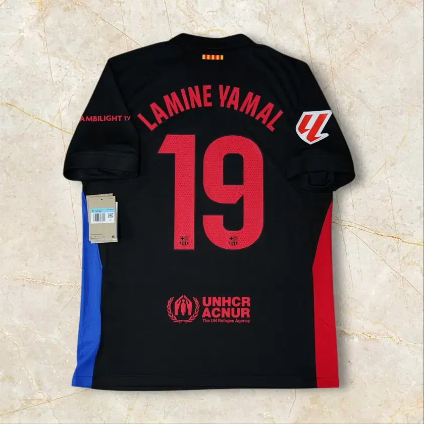 LAMINE YAMAL アマル 19 バルセロナ✕トラビス コラボ 半袖シャツ LAMINE YAMAL アマル 19 バルセロナ✕トラビス コラボ 半袖