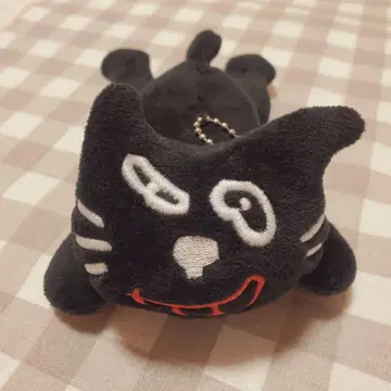 키요 고양이 봉제 인형 누워 있는 모습