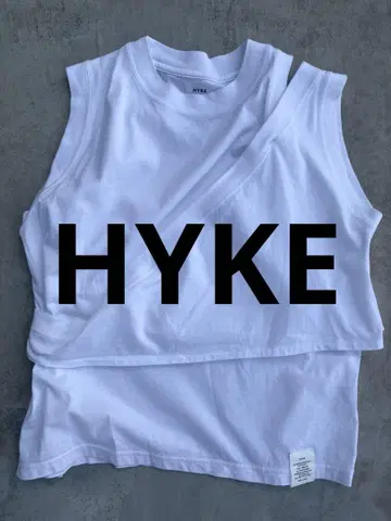 HYKE 크로스오버 슬리브리스 티셔츠 (화이트)