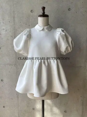 CLARISSE 펄 버튼이 달린 상의 퍼프 슬리브 벌스데이 바쉬