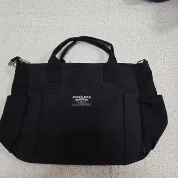 블랙 패브릭 소재 핸드백