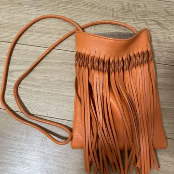 오렌지 프린지 가죽 숄더백
