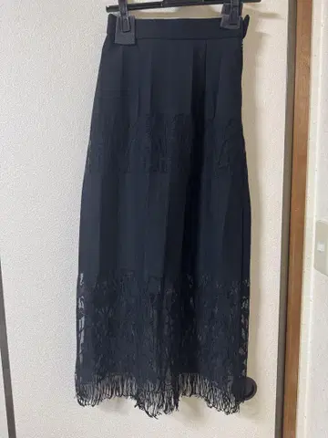 아메리 빈티지의 프린지 블랙 롱 타이트 스커트