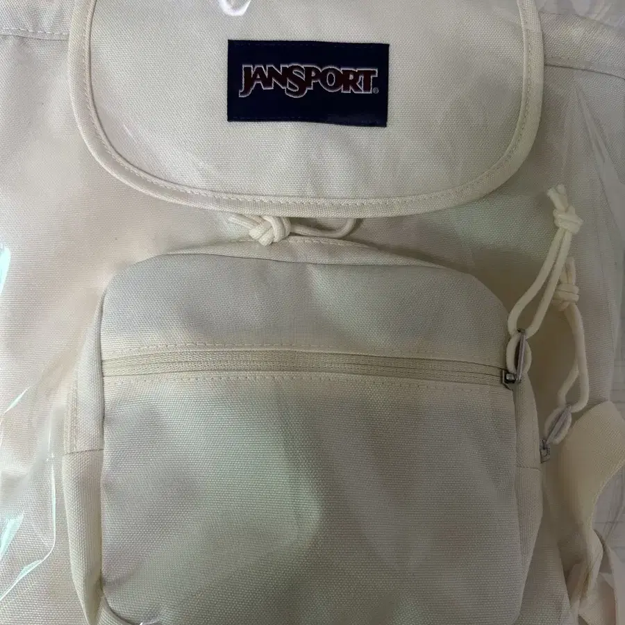 JANSPORT | 잔스포츠 Jansport Highland Mini Backpack Coconut