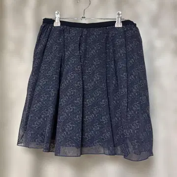 릴리 브라운 네이비 플라워 무릎 기장 플레어 스커트
