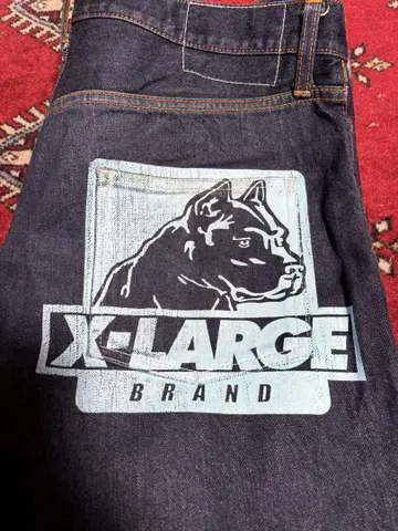 XLARGE 개 로고 데님 팬츠 32