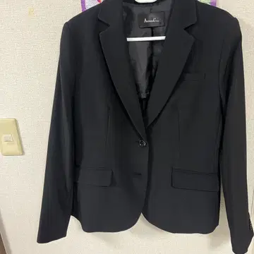 블랙 테일러드 자켓과 팬츠 세트