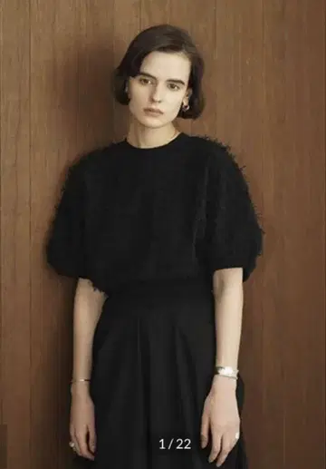 새상품급 CLANE FRINGE ARCH SLEEVE KNIT TOPS