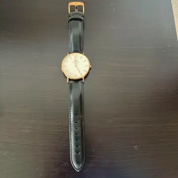 다니엘 웰링턴 DW00100113 골드/블랙