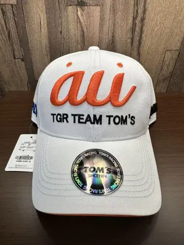au TOM'S 캡