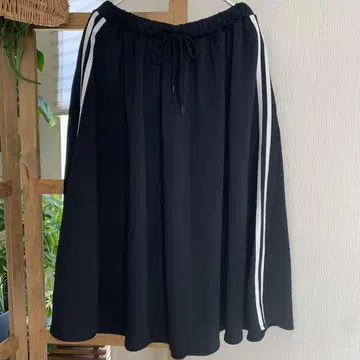 PUNYUS/푸뉴즈 사이드 라인 저지 스커트