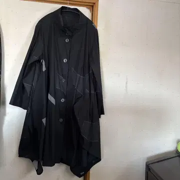 자비로운 비의 코트
