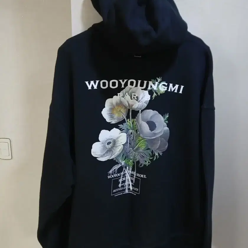 【WOOYOUNGMI】Flower Back Logo Hoodie Black Flower Back Logo Hoodie - WOOYOUNGMI