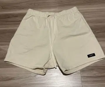 LYFT LOGO WAPPEN SWEAT SHORTS - IVORY