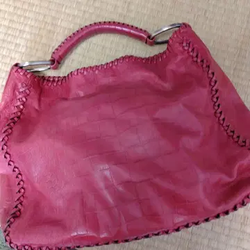 사자비, 외날 가죽 백