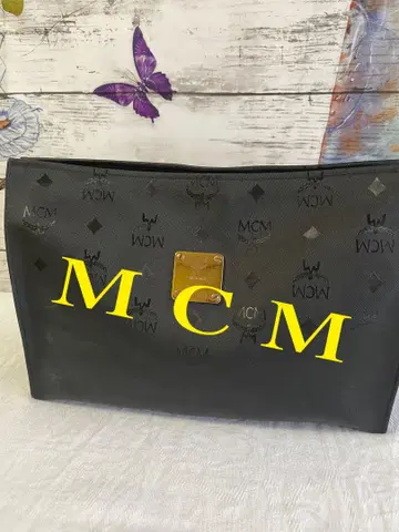 MCM 블랙 클러치백 하자품
