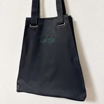 자수 로고 플리츠 토트
