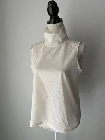 아이보리 스트레치 나일론 슬리브리스 상의