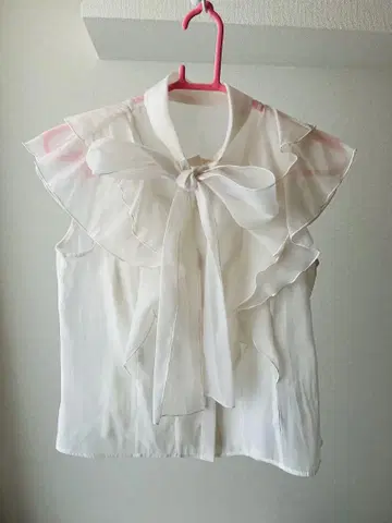 블라우스 슬리브리스