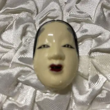 전통적인 오비 고정 띠 인형 얼굴