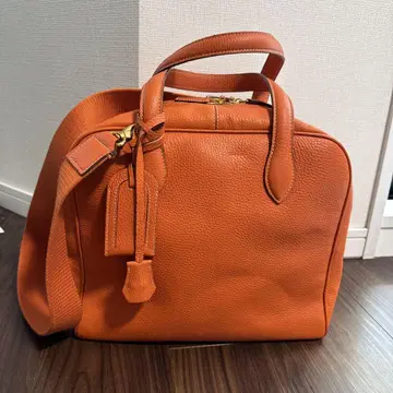 오렌지 핸드백 지퍼