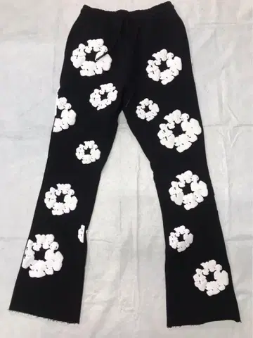 DENIM TEARS 프린트 아메리칸 하이스트릿 마이크로 플레어 팬츠
