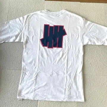 undefeated 롱 T