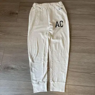 아메리카나 x 청바지 팩토리 별주 AC 빅 로고 프린트 스웨트 팬츠