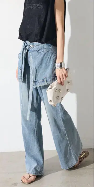 EACIKA 레이어드 데님 밑단 플레어 팬츠