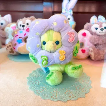 올멜 인형 배지