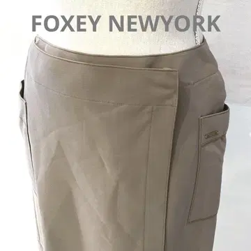 폭시 뉴욕 랩 스커트 사이드 포켓 부착 브라운