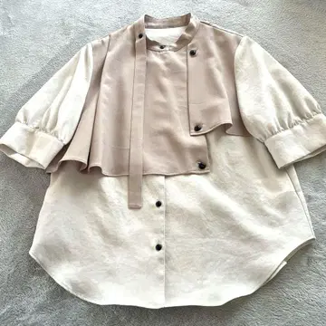 유나이티드 도쿄 하프 타이 숏 볼륨 소매 블라우스