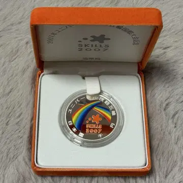 유니버셜 기술 올림픽 국제 대회 기념 2007 천엔 은화 프루프 메달